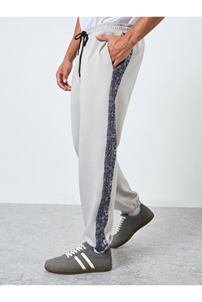 Styli Men Grey Joggers with Printed Side Panel