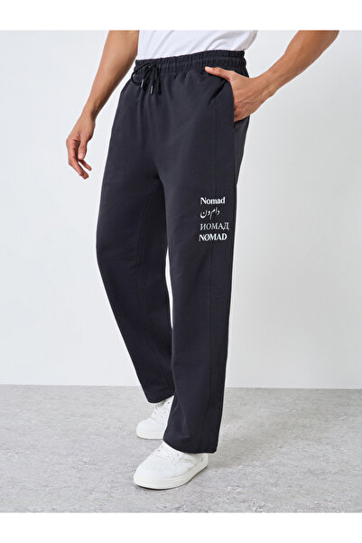 Styli Men Black Slogan Print Relaxed Joggers