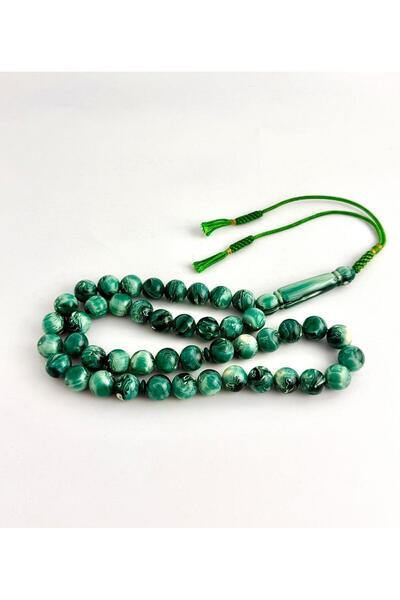 221331 An elegant rosary made of bakelite, with a handmade tassel.