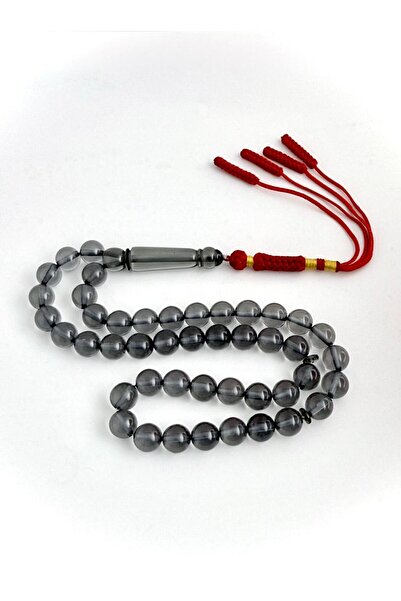 221331 An elegant rosary made of bakelite, with a handmade tassel.