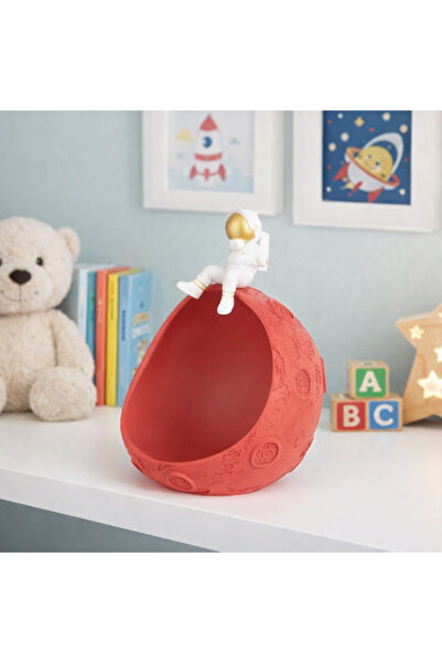 Vi Markets Creative decorative piece featuring a small astronaut figure sitting