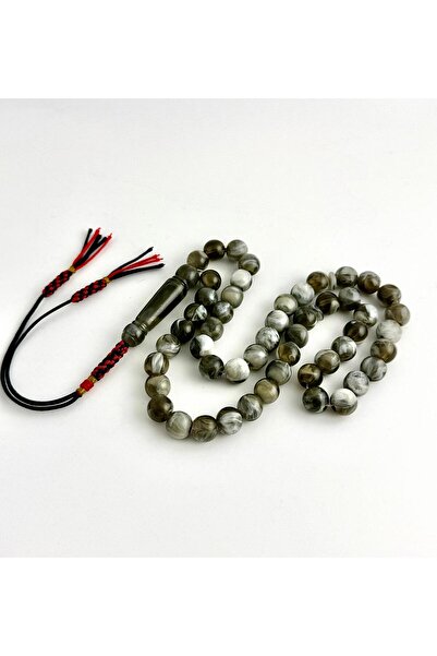 221331 An elegant rosary made of bakelite, with a handmade tassel.