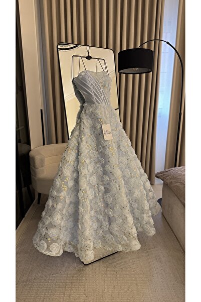 Nareen Fashion An elegant dress adorned with a delicate rose pattern that add...