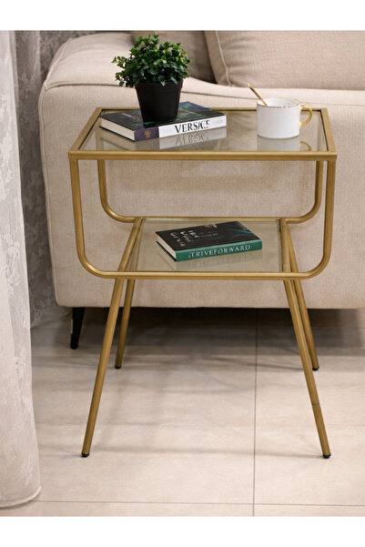 CN A side table in a modern, elegant gold color.