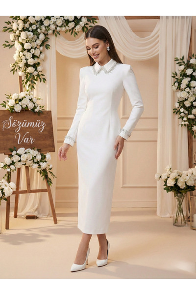 Sultan Ekşioğlu Tasarımı beyaz likralı taşlı abiye elbise