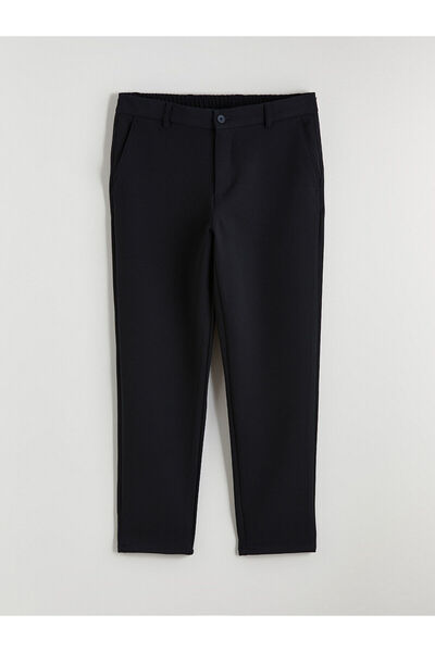 LC Waikiki بنطلون رجالي من مجموعة إلسيفا باللون الأزرق الداكن بقصة قياسية