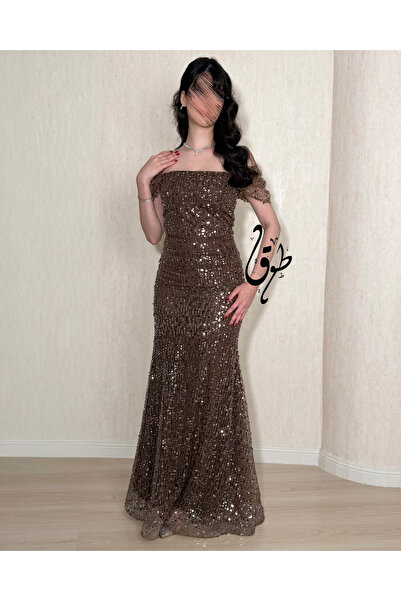 toog A shiny brown off-the-shoulder evening dress with a feminine silhouette.