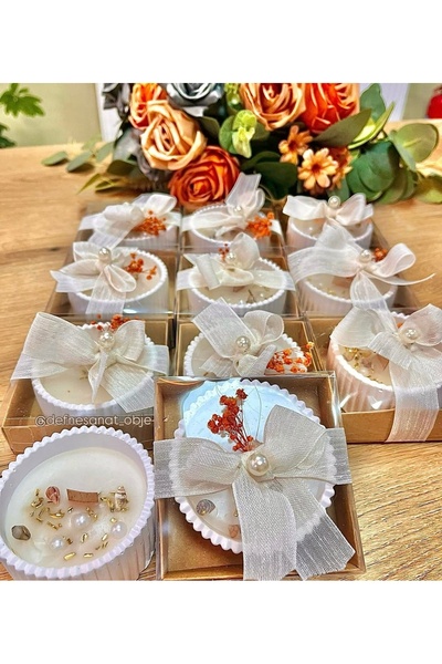 Defne 10 adet kutu içerisinde oval mumluk. Üzeri kuru çiçek süslemeli. Söz, n...