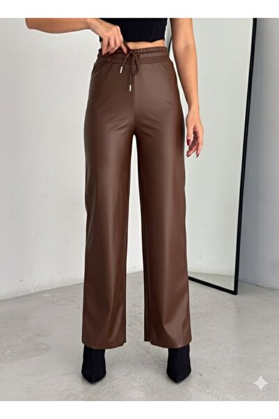 Kanonik Education High waist wide leg Fleece-Lined leather pants.