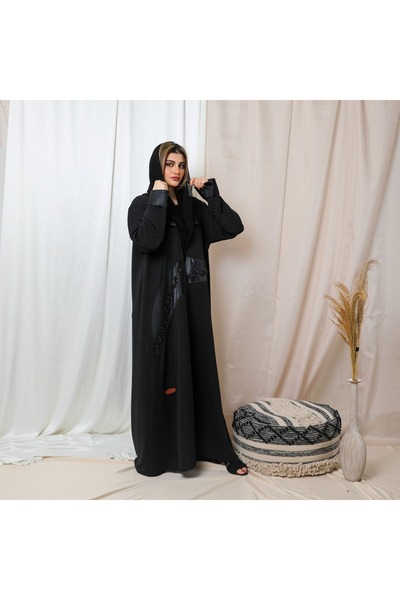Leatherthreads Black abaya with crinkled fabric, open closure, and slanted si...