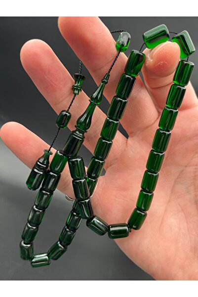 Cemhan Göksal سبحة من حجر العنبر الناري، قطع كبسولي، مقاس 7×10 ملم