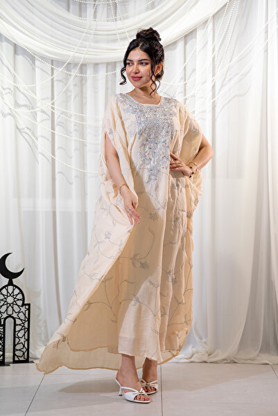 Hasnaa Abaya A Ramadan jalabiya in an apple green color with embroidery and b...