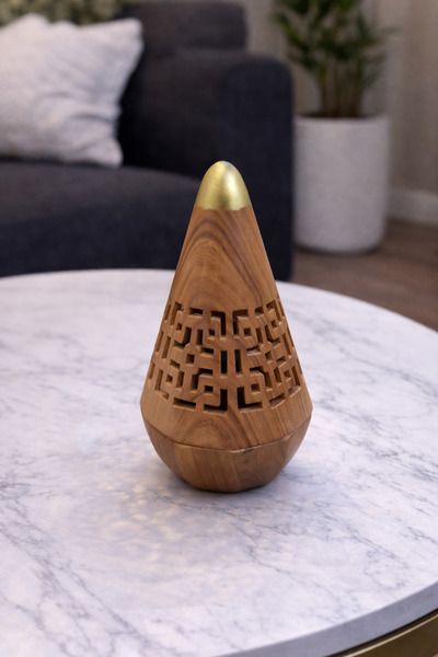 Generic A wooden incense burner with a modern design and a luxurious gold touch.