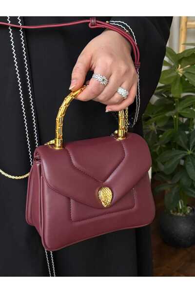 بيت الجملة (translated: House of Wholesale) evening bag