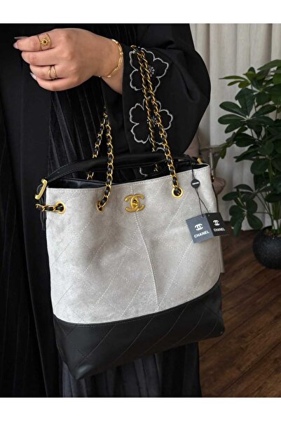 بيت الجملة (translated: House of Wholesale) evening bag