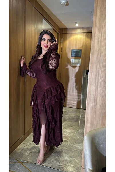 Ta Prince An elegant evening dress with a sophisticated design that reflects ...