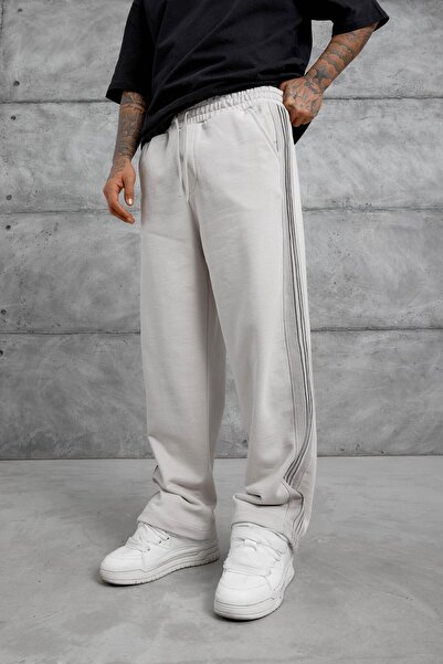 NOMARC Cream Spray Striped Baggy Trackpants