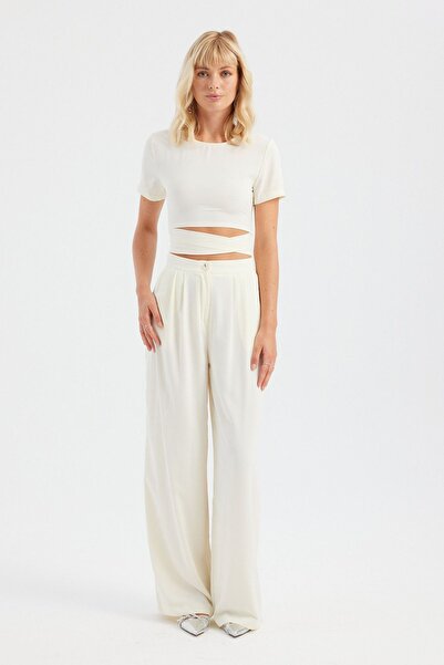 Hiccup 2-piece: Cropped top with round neck and lace-up back and wide, pleate...