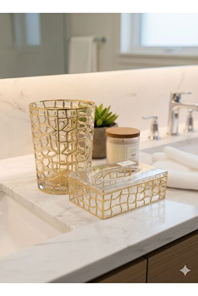 Noor Acrylic basket and tissue box with a gold-colored pattern resembling ice...