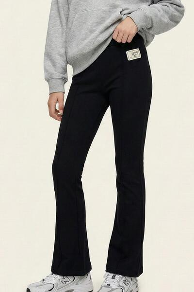 Breeze Girl's Flared Tights with Decorative Metal Heart Emblem and Cima Stitc...