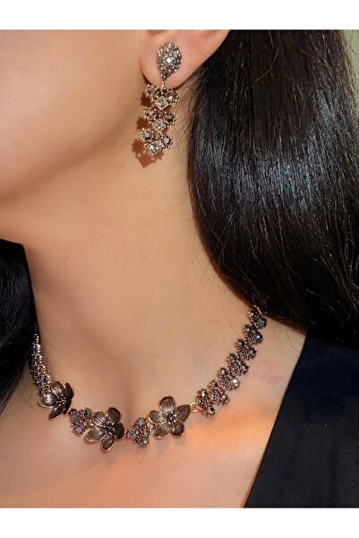 Ceso Accesories طقم قلادة وأقراط على شكل زهرة بلون برونزي عتيق