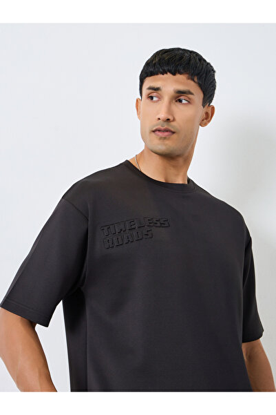 Styli Men Black Oversized Chest Embossed T-Shirt