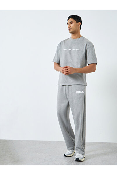 Styli Men Grey Minimal Print Oversized T-Shirt and Joggers Co-Ords