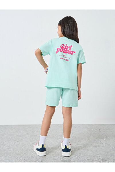 Styli طقم تيشيرت وشورت للبنات باللون الأخضر بطبعة جرافيكية