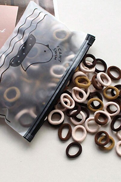 New Obsessions Σετ με 100 μίνι πόρπες από λάστιχο για πετσέτες με τσάντα