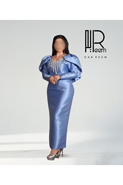 DRM The royal "Lazurd" dress with its dangling crystal collar and modern shou...