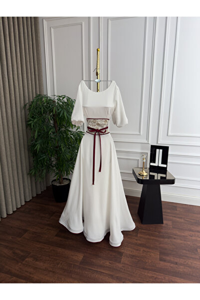 Genenic An elegant white dress that combines simplicity and luxury