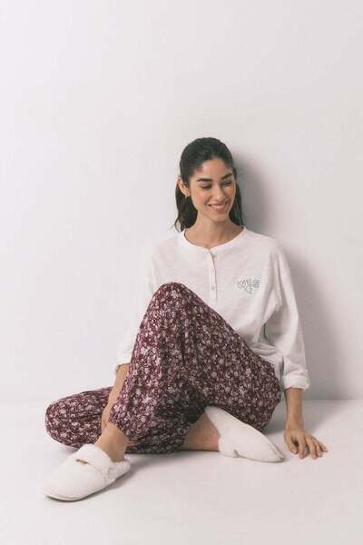 Women'secret بنطلون طويل مطبوع عليه زهور باللون العنابي