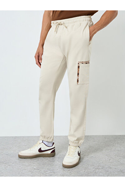 Styli Men Beige Slim Fit Joggers with Pocket Detail