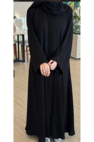 WAHAJ DRESSES A black abaya with an elegant design and a wide cut.