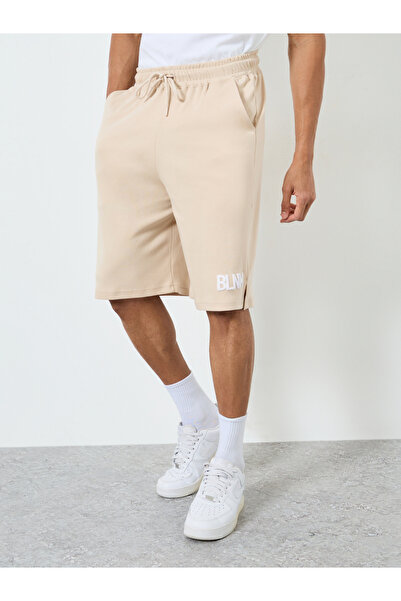 Styli Men Beige Oversized Shorts with Drawstring