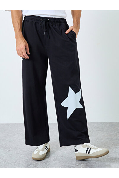 Styli Men Black Star Print Wide Leg Joggers