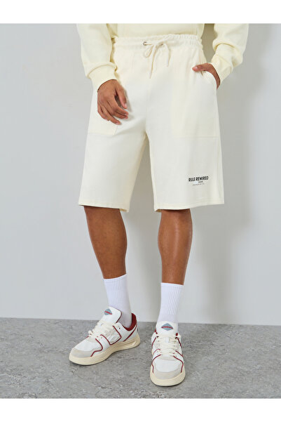 Styli Men Slogan Oversized Shorts
