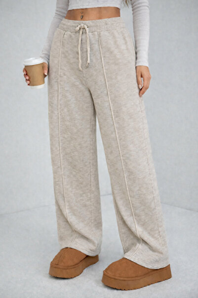 NEWCO Pants with Detailed Lace-Up Cuffs and Basic Knitwear.