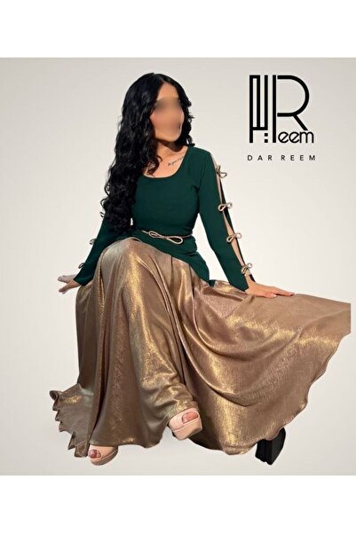 DRM Dar Reem emerald green dress with a shimmering bronze skirt