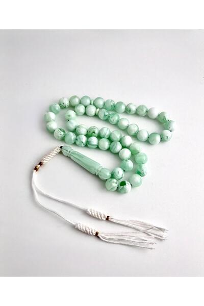 221331 An elegant rosary made of bakelite, with a handmade tassel.