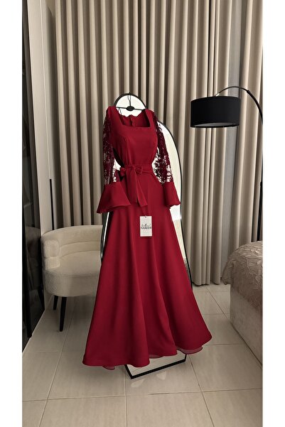 Nareen Fashion A luxurious burgundy dress in a deep, captivating color that e...