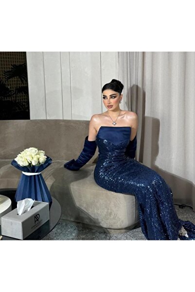 TARFA This dress, in a captivating midnight blue hue, exudes regal elegance.