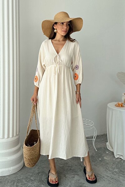 Trend Alaçatı Stili فستان نسائي طويل مبطن باللون البيج وياقة على شكل حرف V وأ...