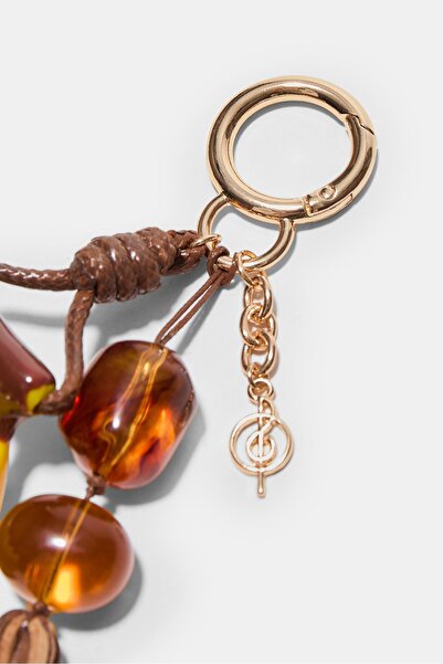 Stradivarius Muz figürlü charm