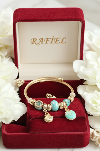 rafiel Ocean Breeze: سوار على شكل محارة باللون الأزرق الذهبي (فولاذ 316L)