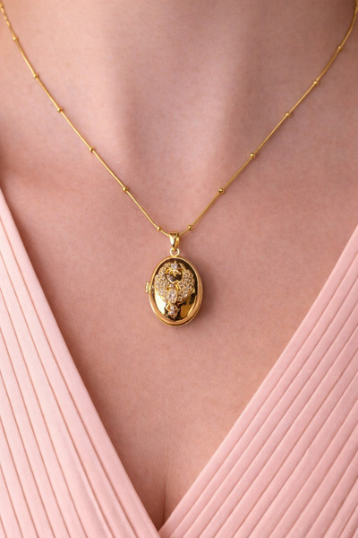 Uzak Işıklar قلادة من الفولاذ على شكل عبّانة مرصعة بحجر الزركون باللون الذهبي