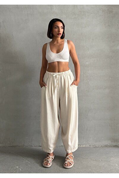 BEJNA Spodnie damskie w kolorze beżowym z teksturą lnianą w kształcie balonu