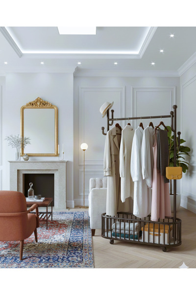 Un علاقة ملابس اسود معدن بعجلات متحركة بتصميم عصري