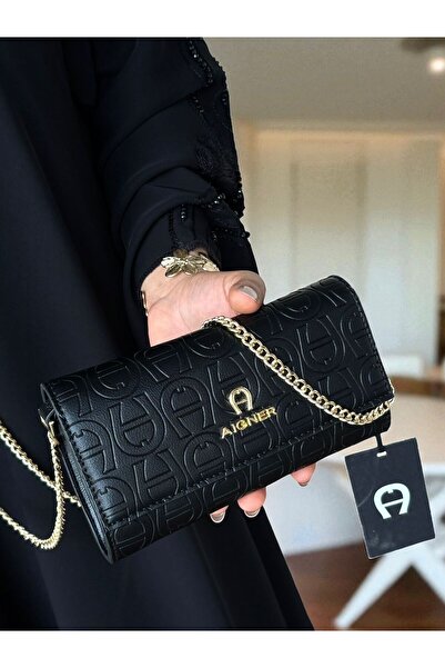 Generic Women's crossbody bag with a small brown chain and card holder; can b...