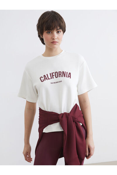 LC Waikiki Γυναικείο μπλουζάκι Özmarka New Season Crew Neck California με στάμπα